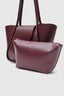 Sac en cuir bordeaux large avec pochette de maquillage