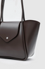 Sac en cuir bordeaux large avec pochette de maquillage