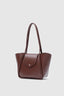 Sac en cuir bordeaux large avec pochette de maquillage