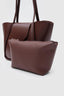 Sac en cuir bordeaux large avec pochette de maquillage