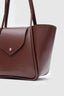 Sac en cuir bordeaux large avec pochette de maquillage